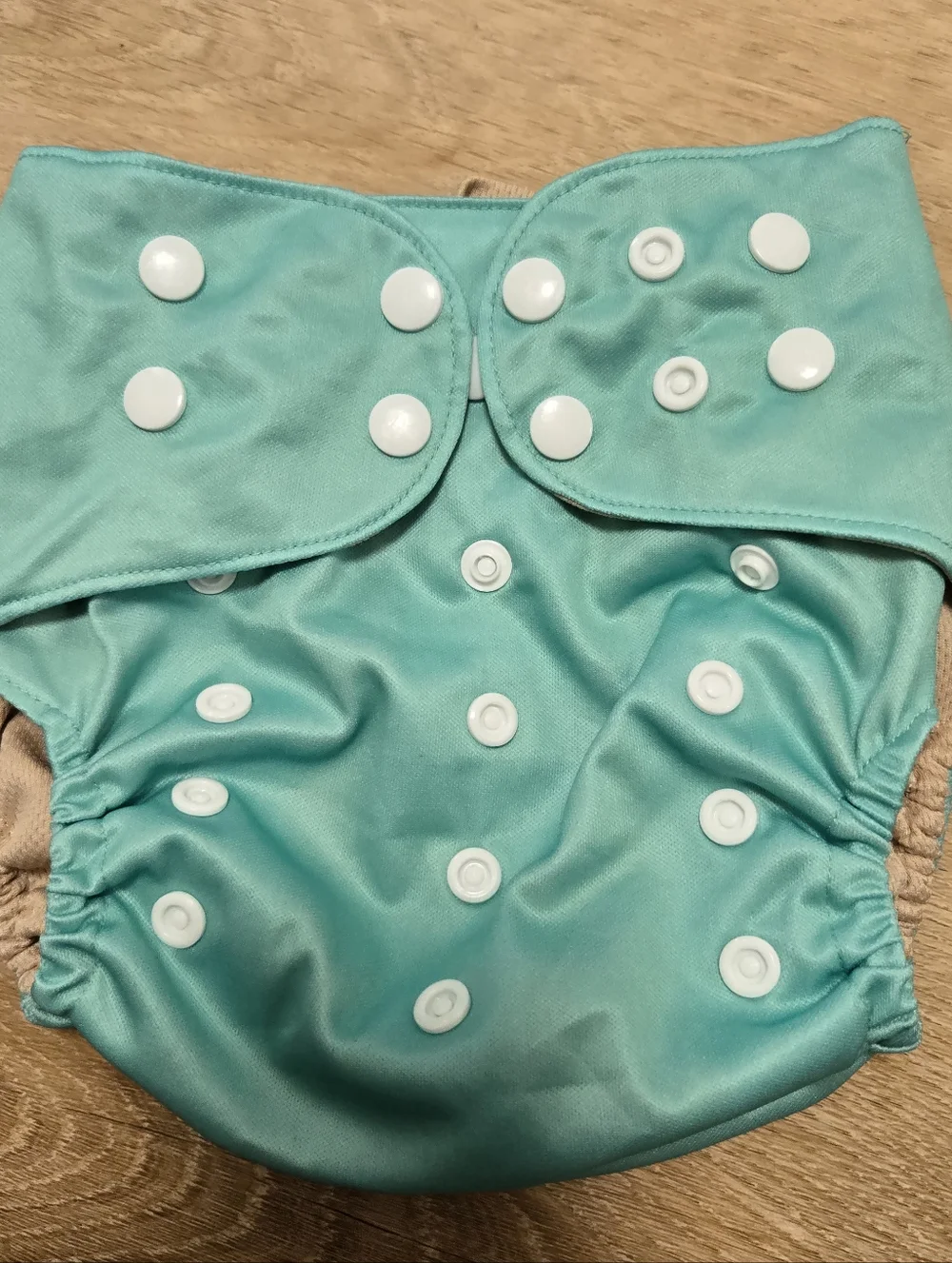 Dino diapers one size pocket diaper seafoam green color